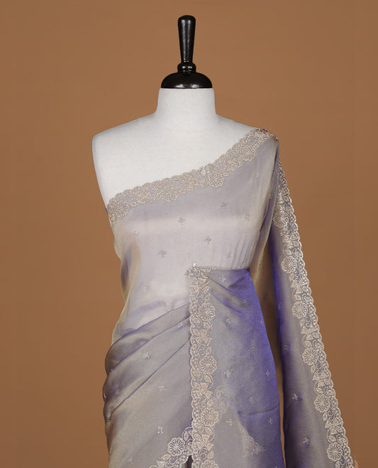 Lavender colour designer saree featuring stone worked body, stone worked border, paired with matching blouse piece.