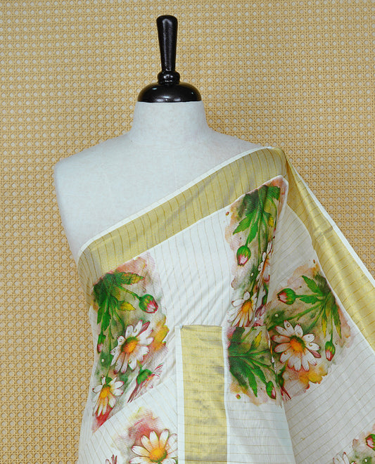 Cream Colour Kerala Saree Featuring Gold Zari Stripes On The Body, Enhanced By A Gold Zari Border With Floral Prints And A Matching Pallu, Paired With A Matching Blouse Piece.