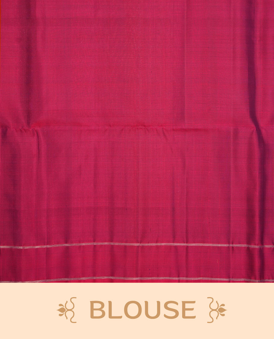 Burgundy colour soft silk saree featuring gold zari motifs on body, complemented by self colour with traditional border with tassel at pallu, paired with matching blouse piece.