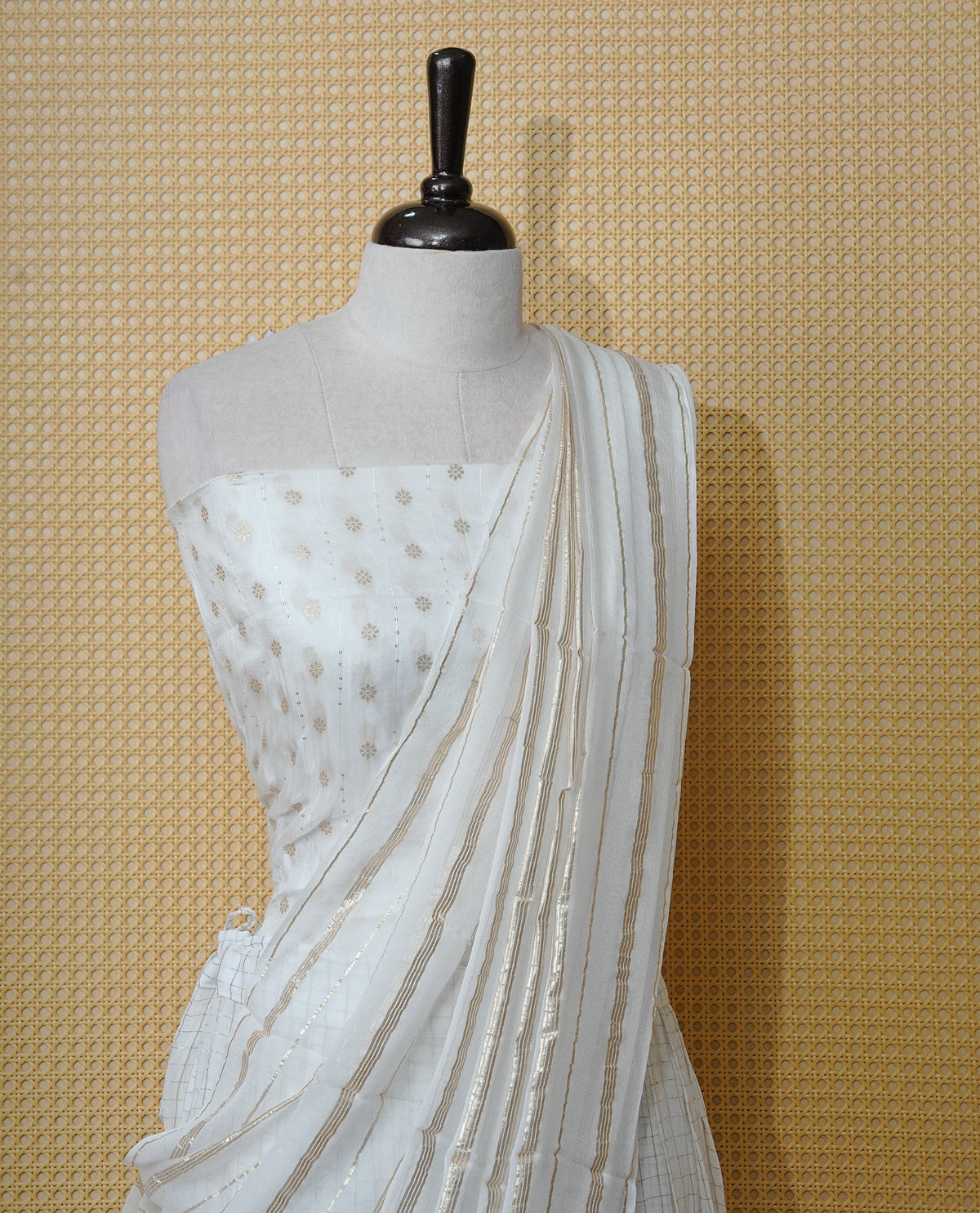 Off white colour Semi stitched dhavani set featuring Gold zari check pattern with Self colour border skirt, paired with matching blouse & dupatta.