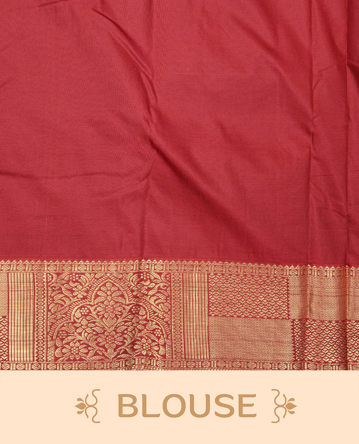 Cream colour semi wedding saree featuring light gold zari box with check with chakra across the body, complemented by maroon colour with  traditional border. Comes with a matching blouse piece.