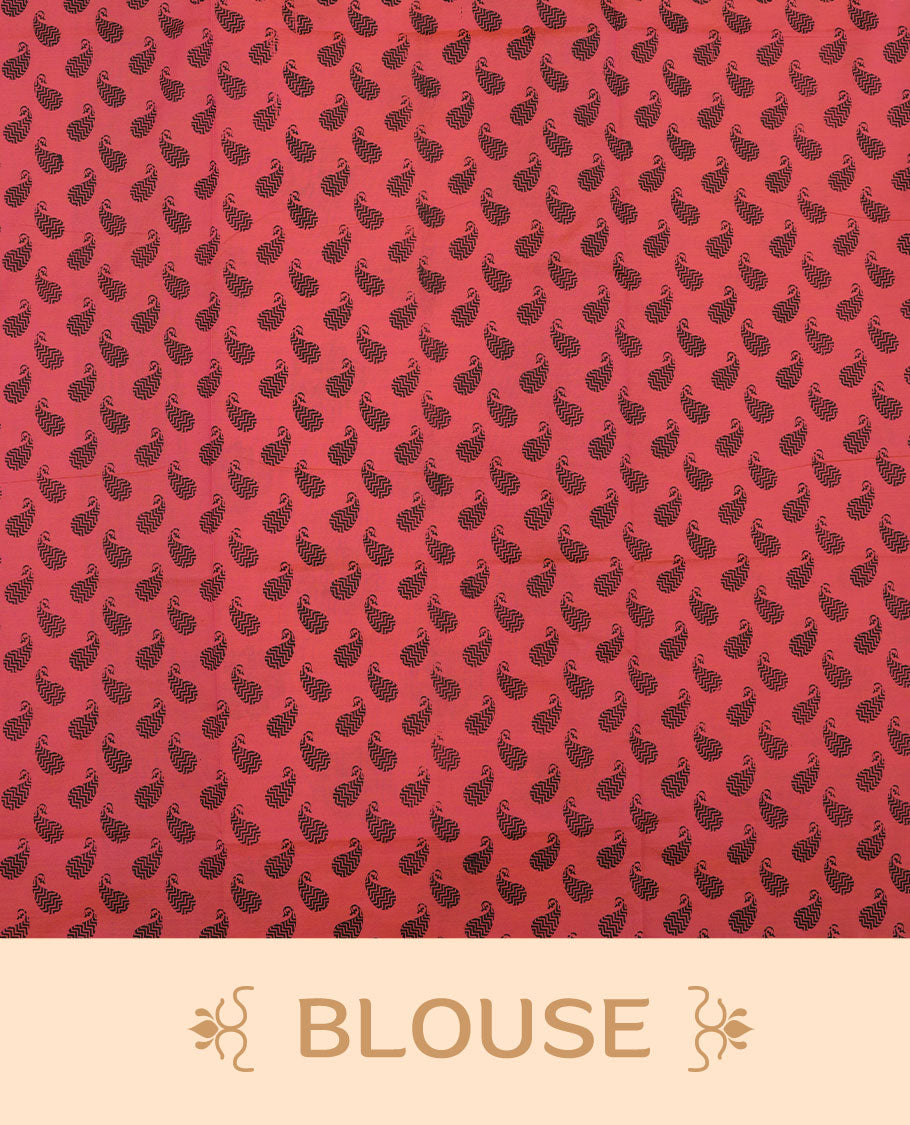 Peach Orange colour poly cotton saree with black floral butti motifs on the body, paired with a matching pallu featuring black ornate floral jaal and stripes on the border, and a coordinated all‑over black paisley printed blouse piece.