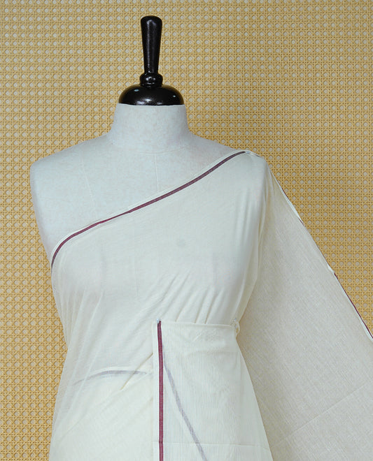 Cream Colour Cotton Kerala Saree Featuring A Classy Plain Body For Effortless Elegance, Enhanced By A Minimalist Maroon Border, Paired With A Matching Blouse Piece.