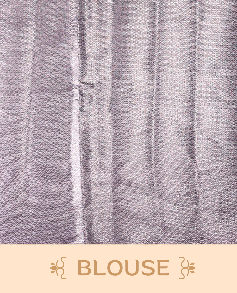 Lavender Pure tissue Banaras saree featuring intricate silver zari weaving all over with a rich pallu and bold paisley motifs, offering a luxurious drape perfect for weddings, festive occasions, and grand celebrations
