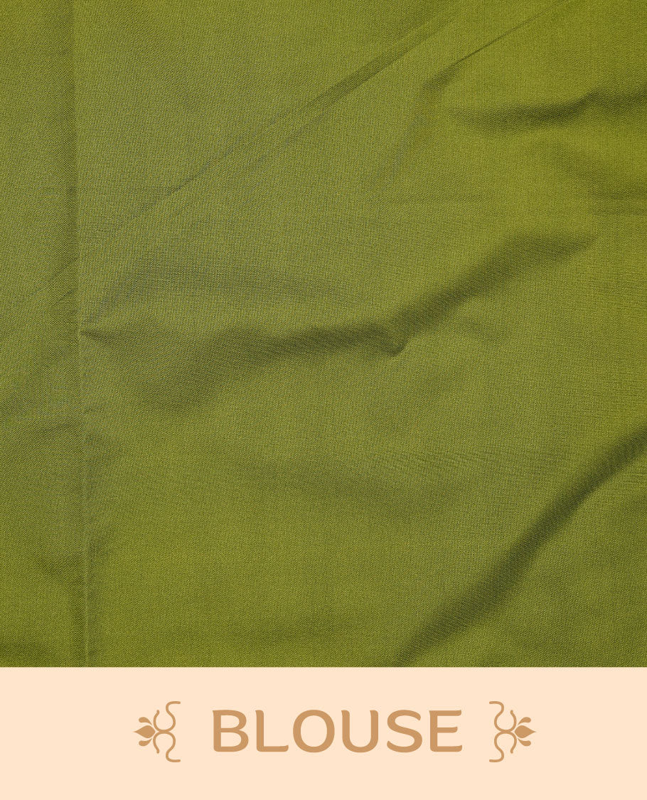 Olive soft silk saree features a sleek borderless design with intricate antique zari motifs, flowing into a seamless self colored pallu and a matching blouse piece.