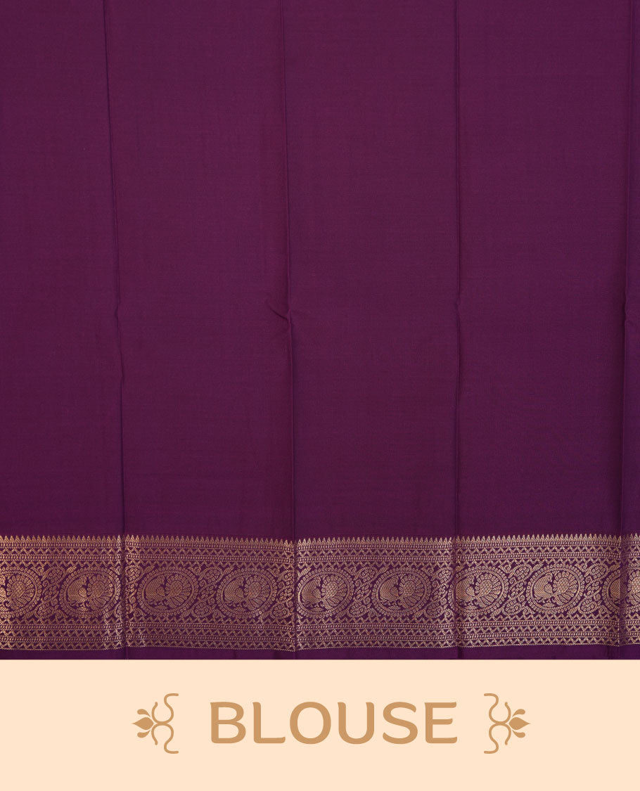 Mustard colour semi silk saree highlighting gold zari check pattern  and motifs across body, featuring contrast purple colour border with gold zari pattern, comes with matching blouse .