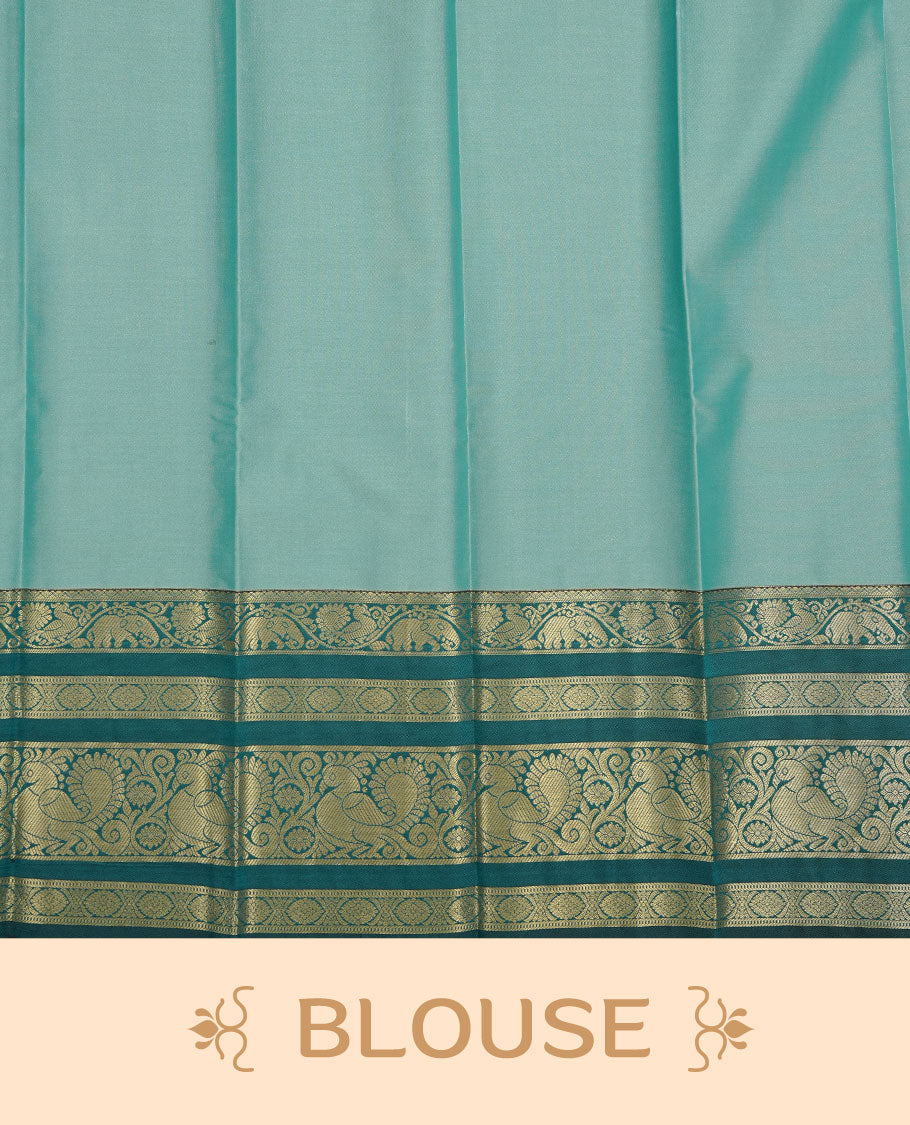 Aqua colour soft silk saree featuring gold zari motifs on body, complemented by contrast Teal colour with zari border, paired with matching blouse piece.