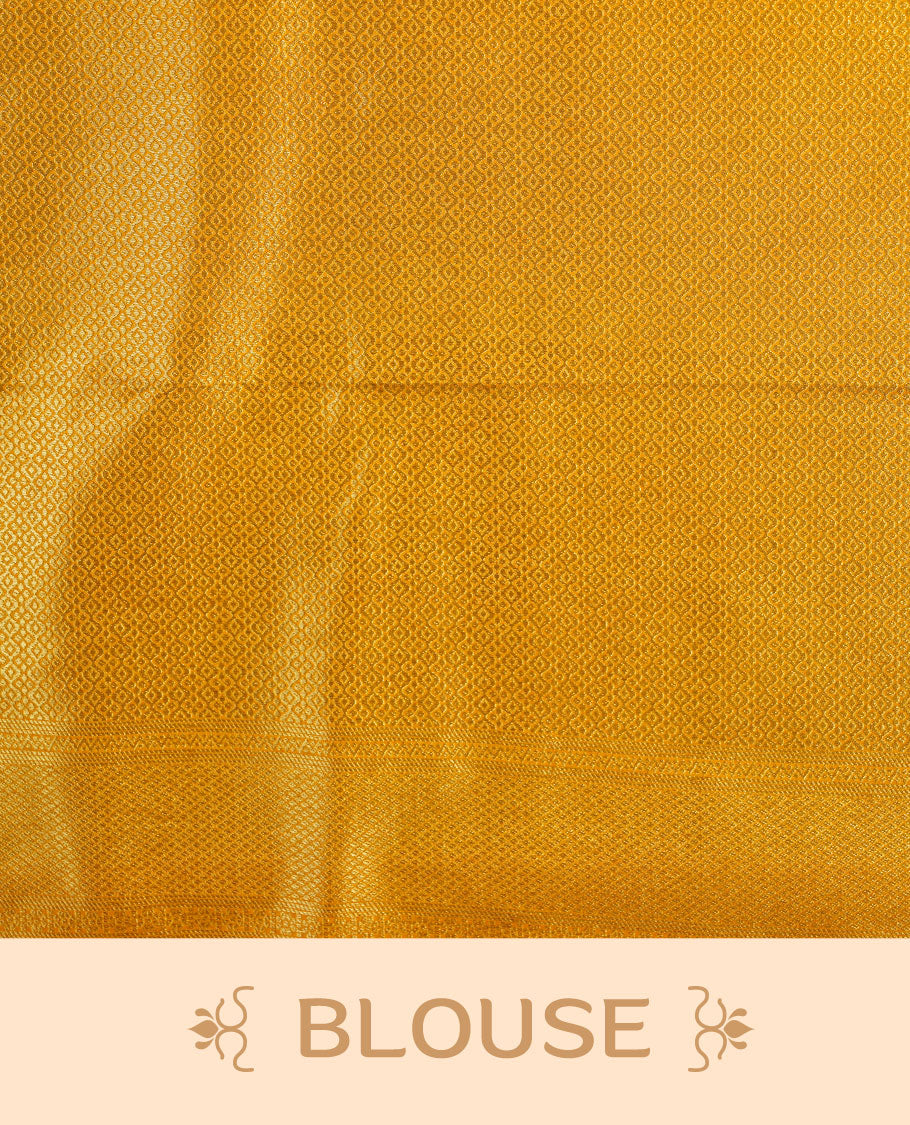 Golden mustard colour semi soft silk brocade saree  featuring elegant self-woven motifs across the body, enhanced with a neatly detailed woven border and pallu, paired with a matching blouse.
