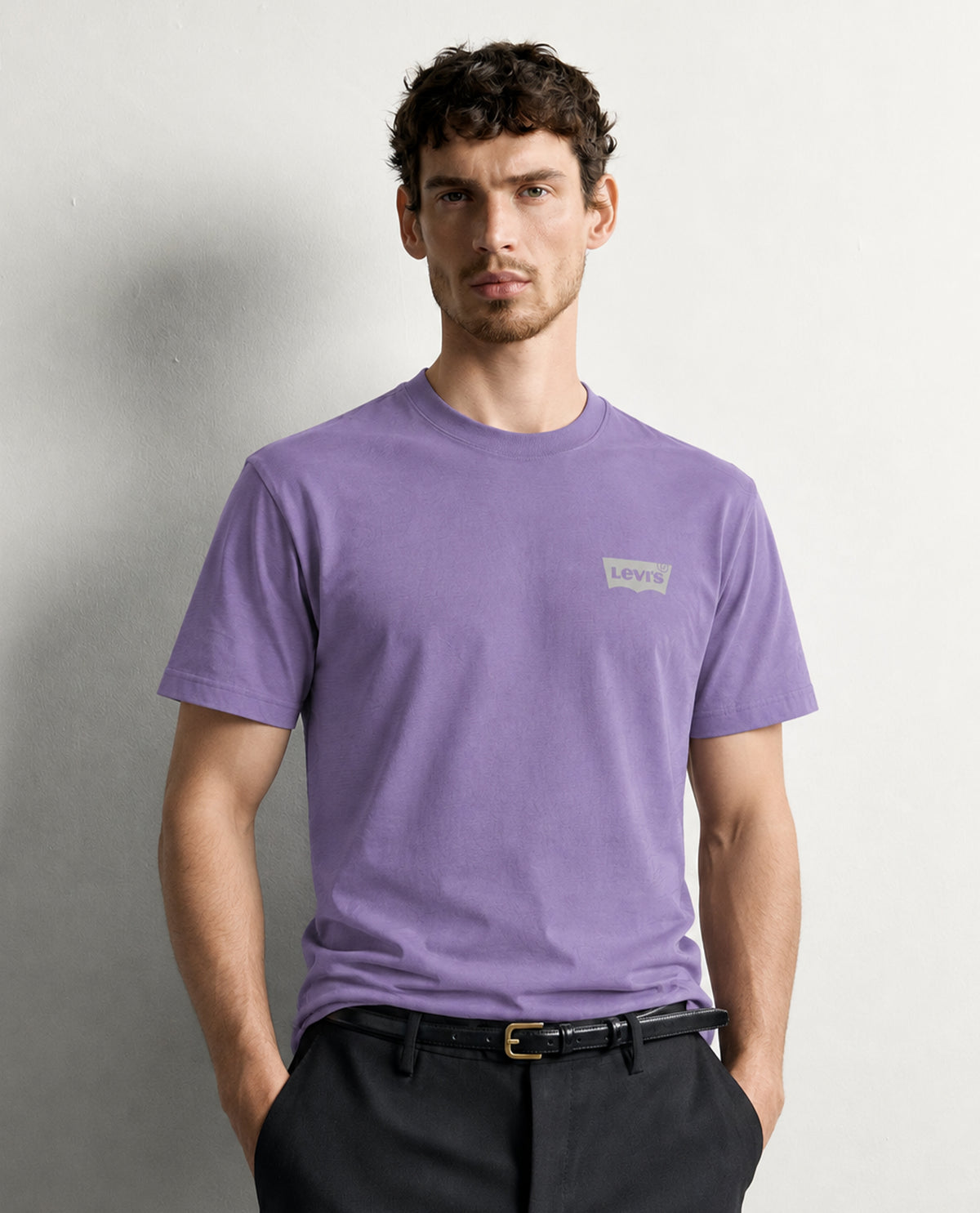 Light purple colour t shirt featuring round design neck, elegant Design body with a text, Half sleeve.