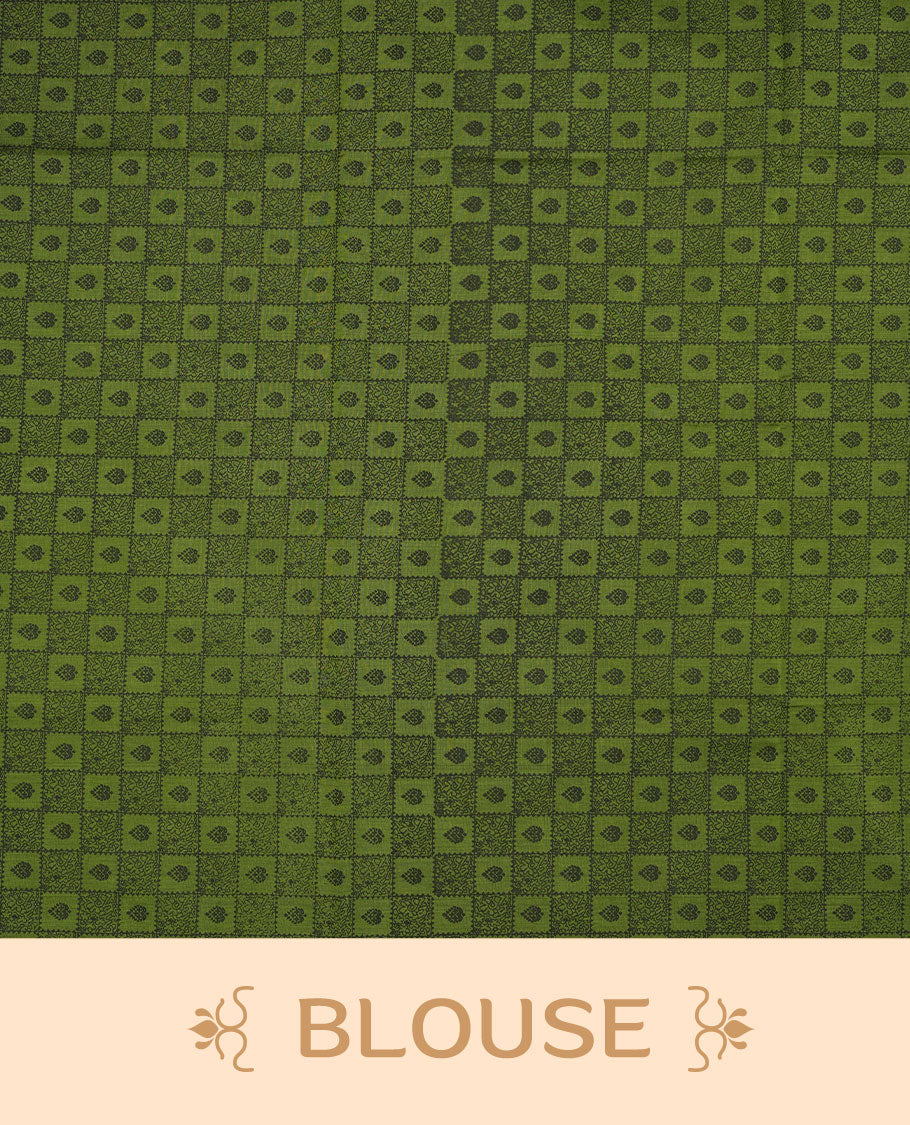 Olive Green colour poly cotton saree with black vertical dotted line pattern on the body, paired with a matching pallu featuring black zigzag geometric border, and a coordinated all‑over black stylised fleur‑de‑lis printed blouse piece.