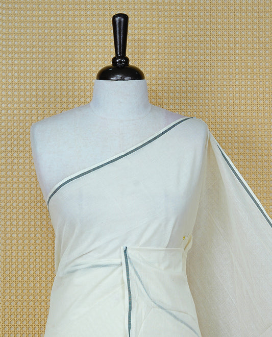 Cream Colour Cotton Kerala Saree Featuring A Classy Plain Body For Effortless Elegance, Enhanced By A Minimalist Black Border, Paired With A Matching Blouse Piece.