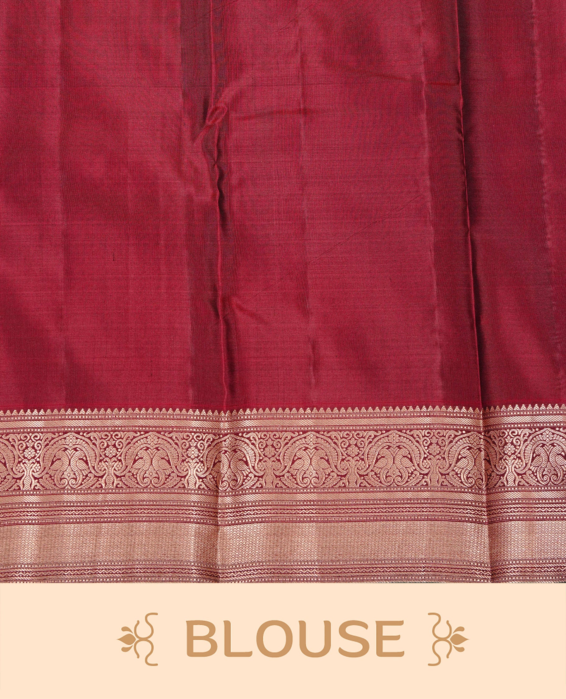 Maroon colour Kancheepuram Silk saree featuring Gold zari motifs on body, Enlighting Self Colour with Gold zari traditional & Green colour piping border, paired with a matching blouse piece.