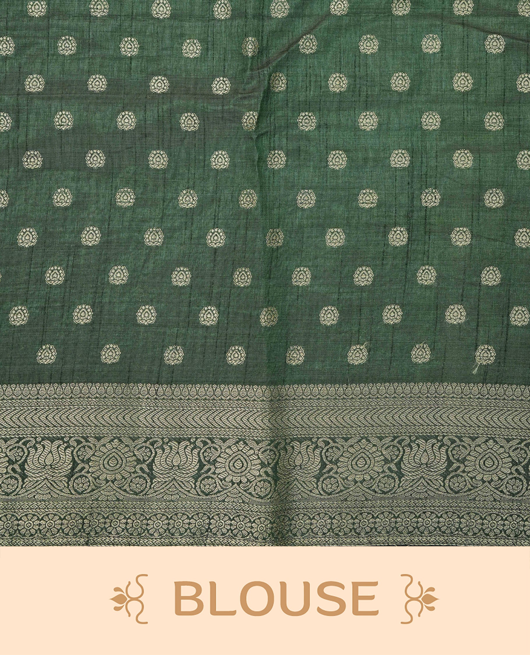 Light Gold Tussar saree featuring Gold zari buttas on body, complemented by contrast dark green Colour with Gold zari border, comes with matching blouse piece.