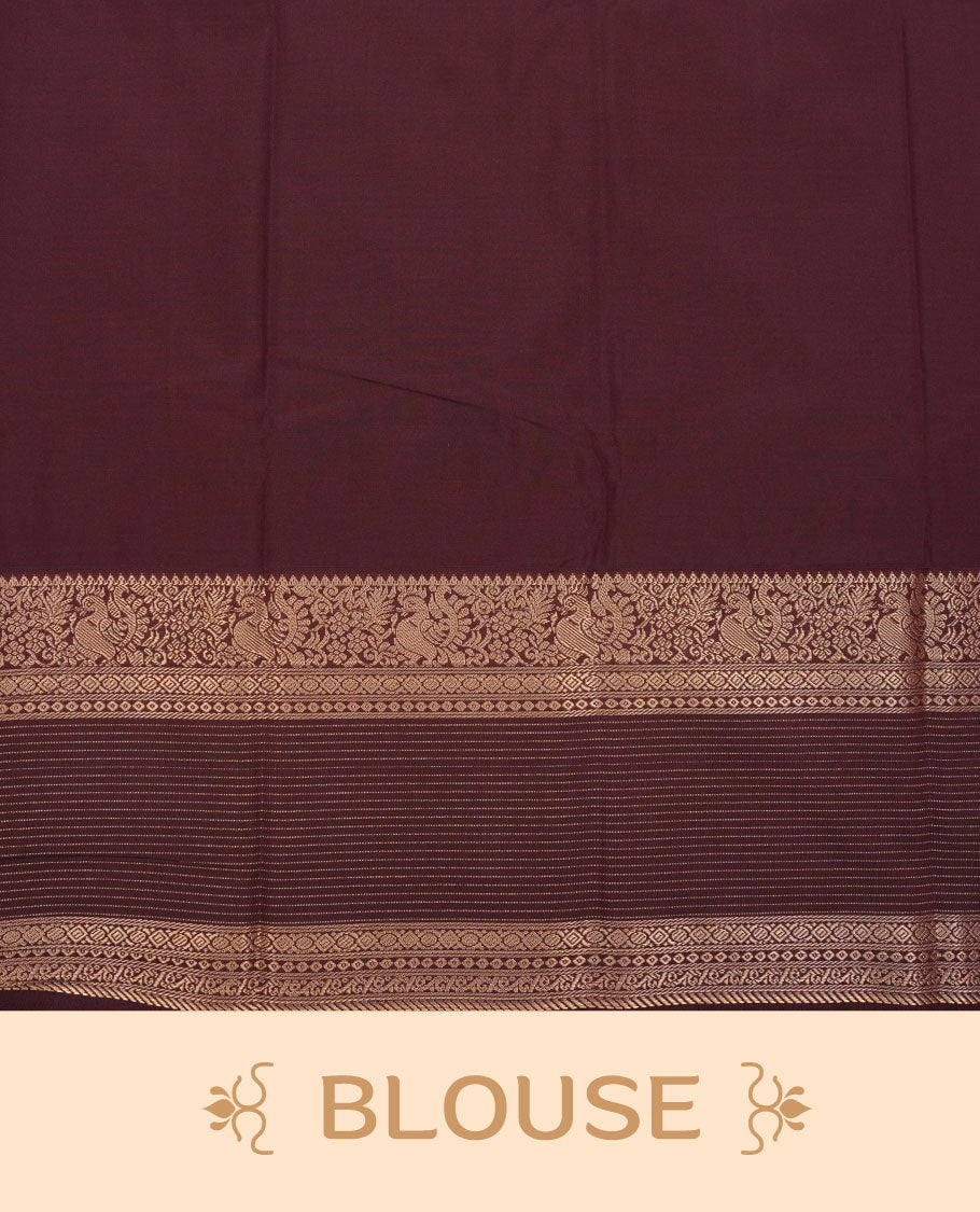 Dark Rust orange colour semi silk saree featuring gold zari stripes and floral motifs on body highlighting contrast dark chocolate gold zari peacock border , paired with matching blouse