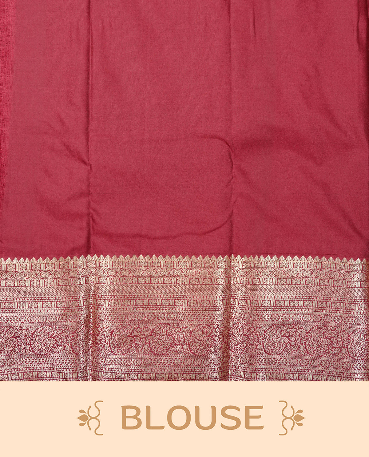 Deep wine colour semi wedding saree featuring light gold zari floral kodi pattern motifs across the body, complemented by contrast self colour traditional border. Comes with a matching blouse piece.
