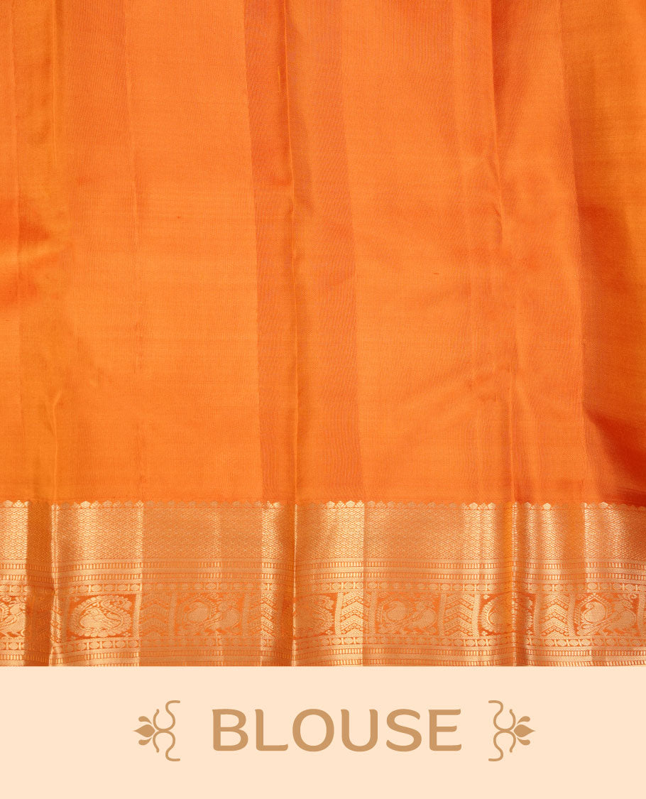 Golden mustard colour kancheepuram silk saree featuring floral meena zari jacquard on body with traditional border, paired with matching blouse piece.