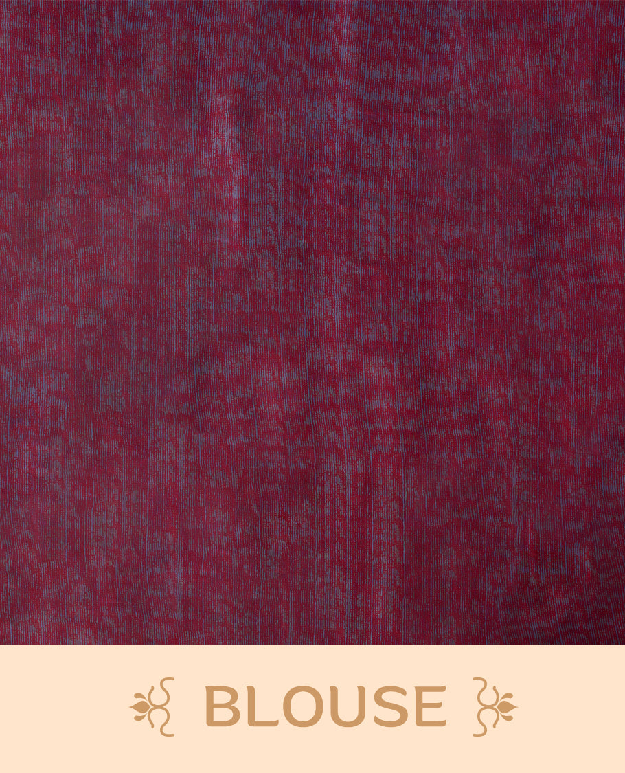 Maroon colour saree with with large big polka dots on the body, self stripped pallu & Comes with a stylish matching blouse.