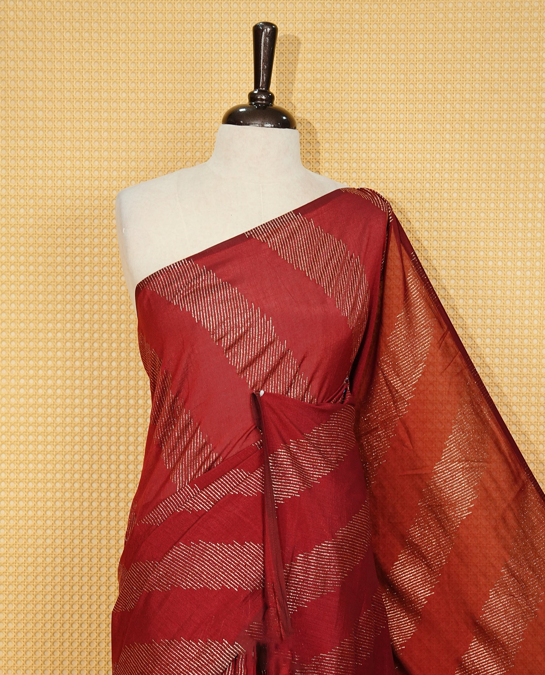 Maroon colour Vijitra silk Saree Featuring Leheriya style gold Printed body, complemented by contrast pallu & tassels