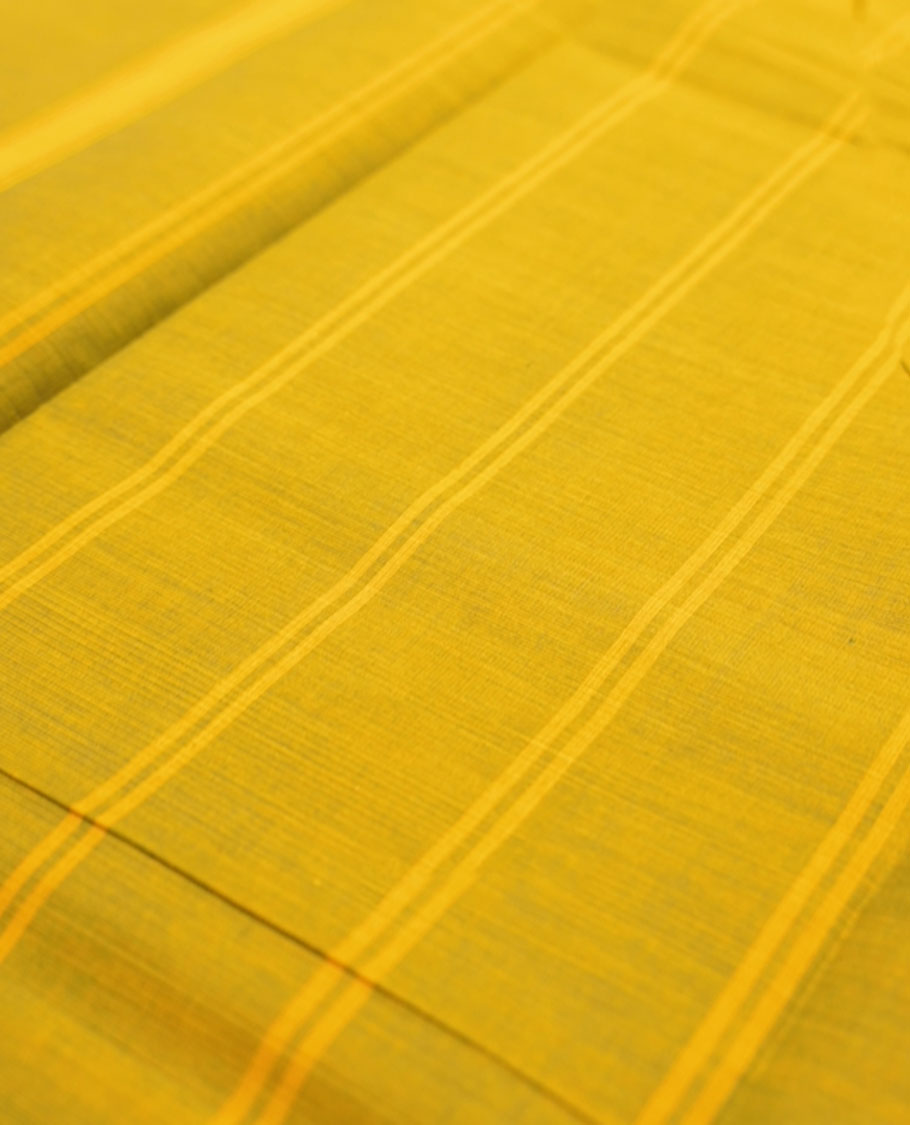 Lemon yellow with dark green dual tone colour chettinad cotton saree with traditional gold zari border without blouse piece.