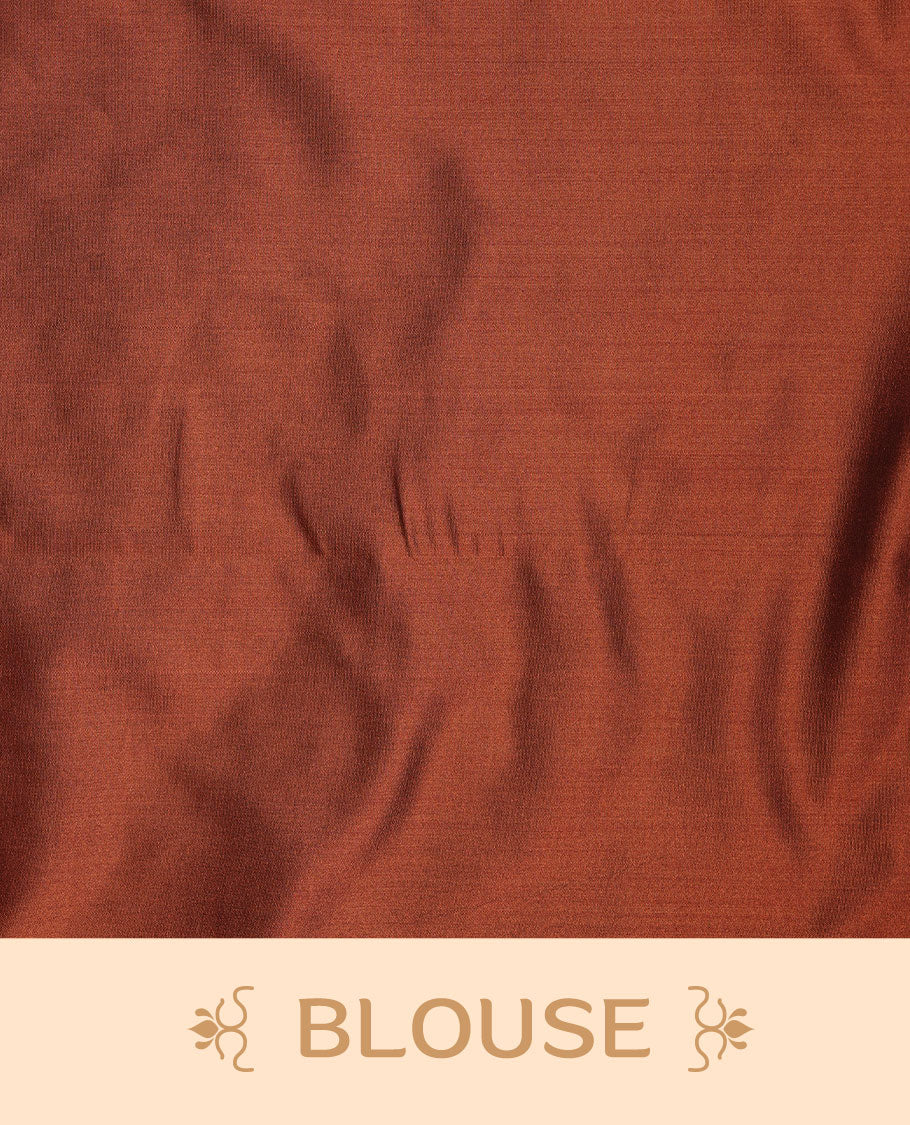 Chocolate colour soft silk saree features a sleek borderless design with intricate antique zari motifs, flowing into a striking contrast burnt orange and a matching blouse piece.