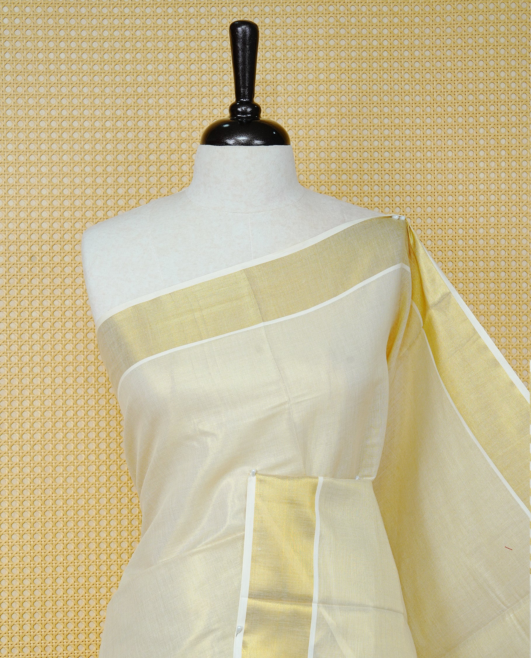 Cream Colour Tissue  Kerala Saree Featuring  Plain  Body, Enhanced With A Gold Zari  Border, A Traditional Gold Zari Pallu, And A Matching Blouse Piece.