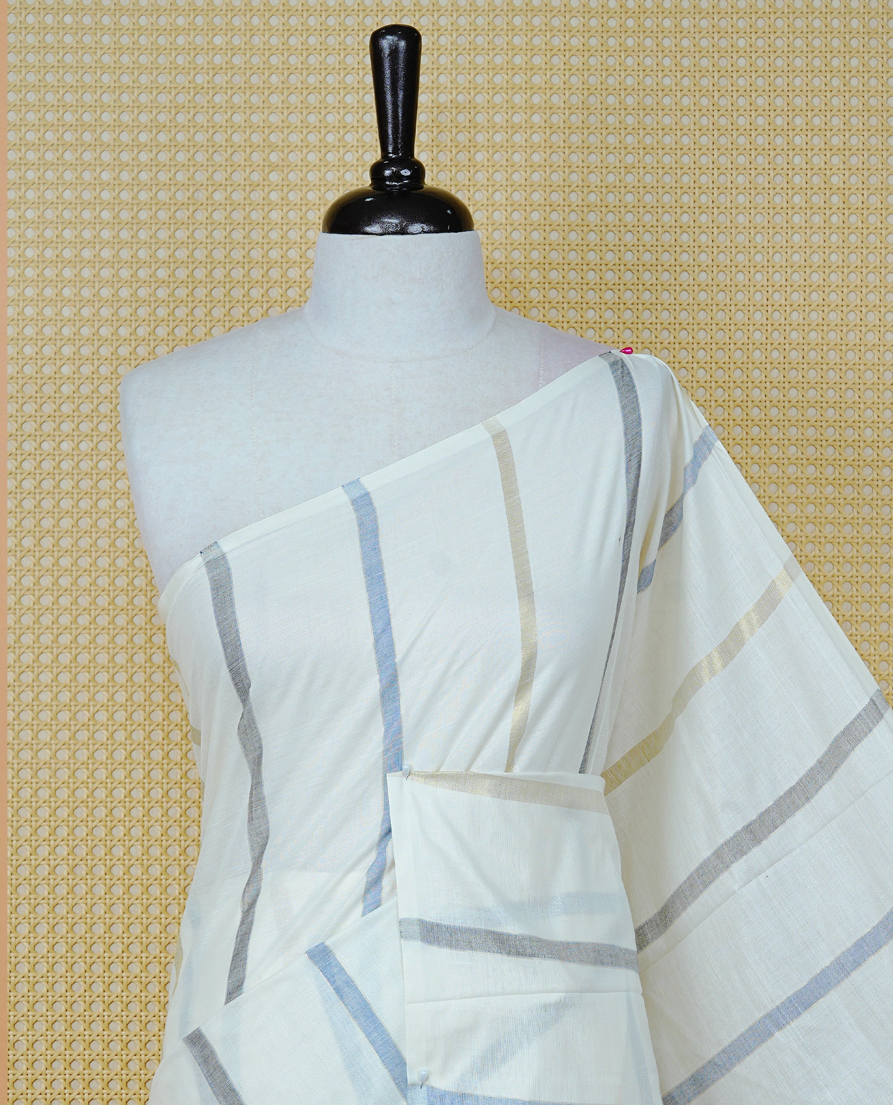 Off White Colour Cotton  Kerala Saree Featuring Light Gold & Grey , Blue Zari Stripped Body, Enrich By Zari Border, Pallu ,Comes With Matching Blouse Piece.