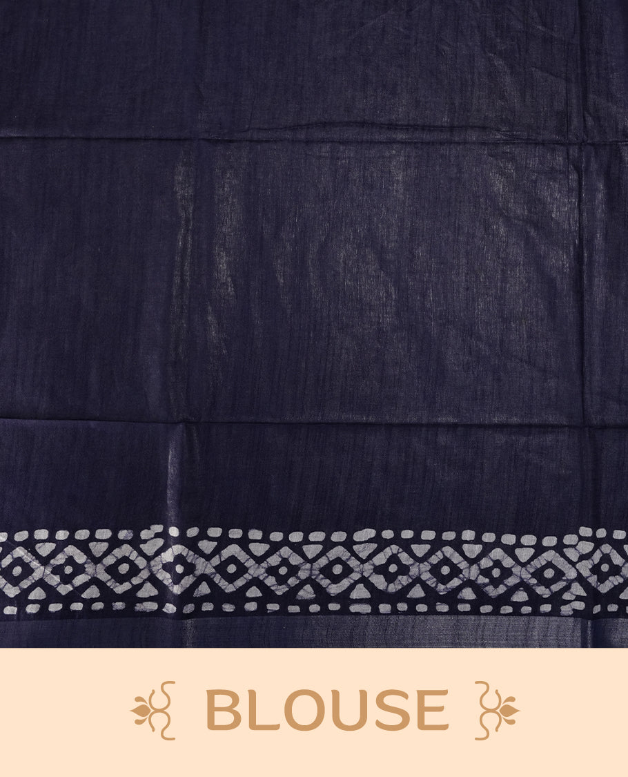 Navy blue colour semi jute tissue saree featuring white floral prints across the body, adorned with intricate geometric woven borders and a graceful floral work pallu & Comes with a matching blouse piece.