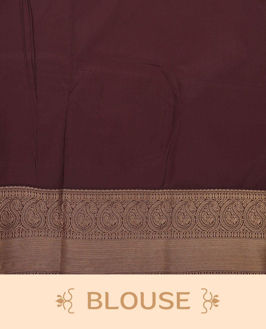 Rust orange colour semi silk saree featuring gold zari dotted stripes with motifs on body highlighting contrast dark chocolate gold zari mango border , paired with matching blouse