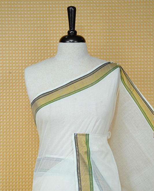 Cream colour Cotton kerala saree featuring Classy Plain body, complemented by Gold with Green & Black zari border & Pallu, paired with matching blouse piece.