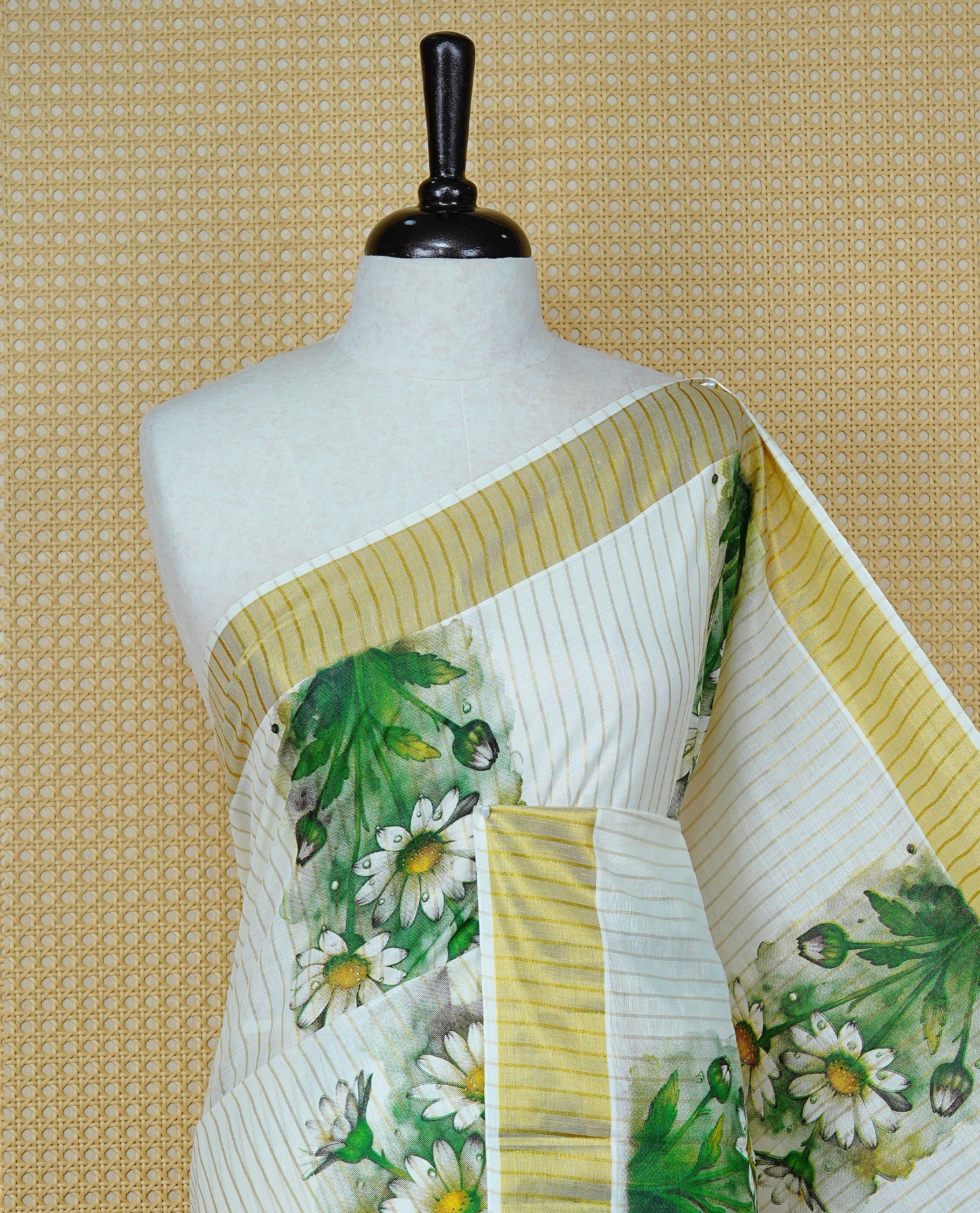 Cream Colour Kerala Saree Featuring A Light Gold Zari Pattern And Floral Prints On The Body, Enriched By A Traditional Zari Border And Pallu, Paired With A Matching Blouse Piece