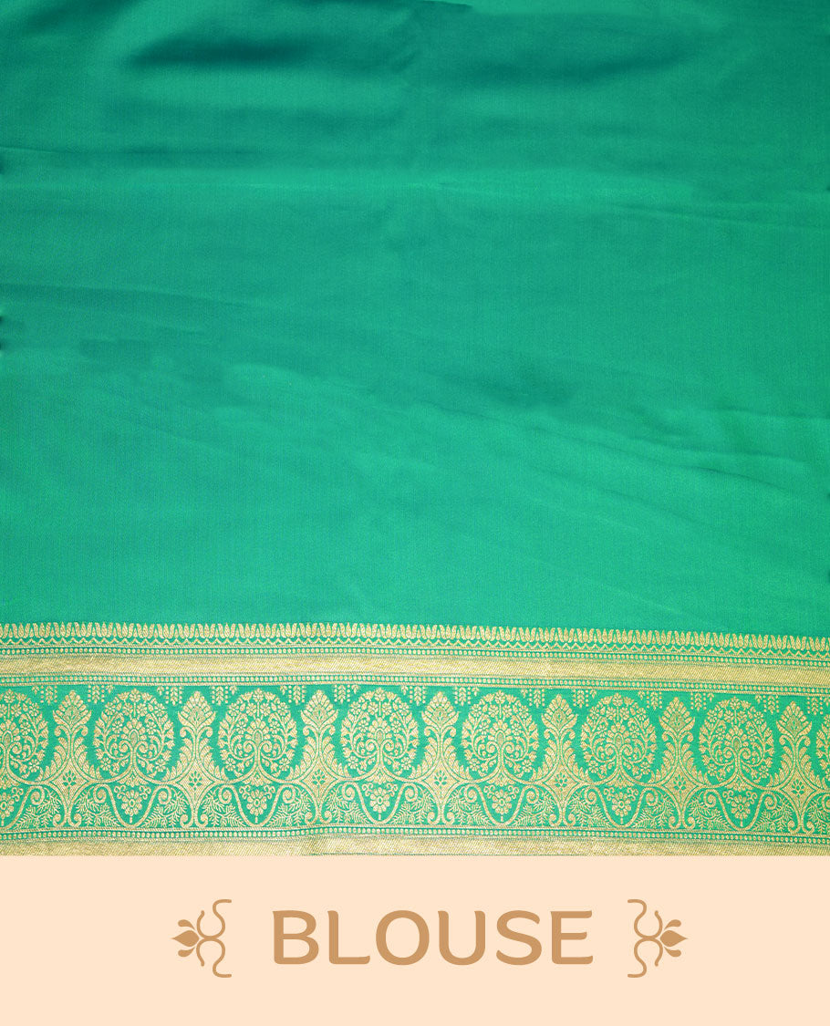 Green colour Banaras Satin Crepe saree featuring gold zari floral motifs on the body, a richly woven traditional border with intricate gold zari detailing, and paired with a matching blouse.