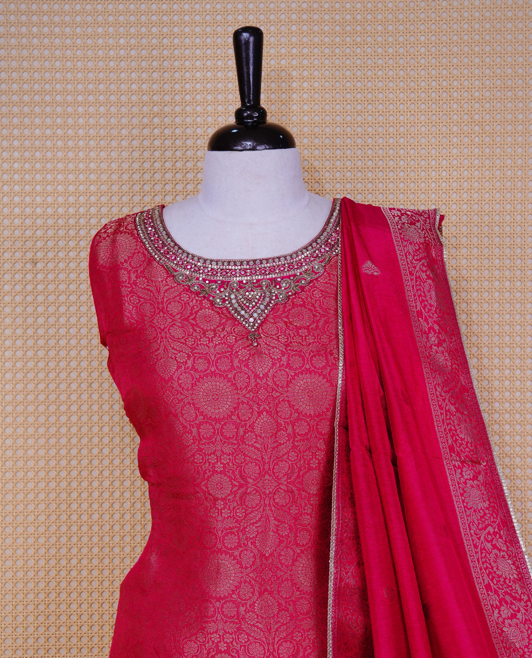 Rani Pink colour churidar set featuring an all-over woven floral pattern and an intricately embellished neckline, paired with matching dupatta & solid pants