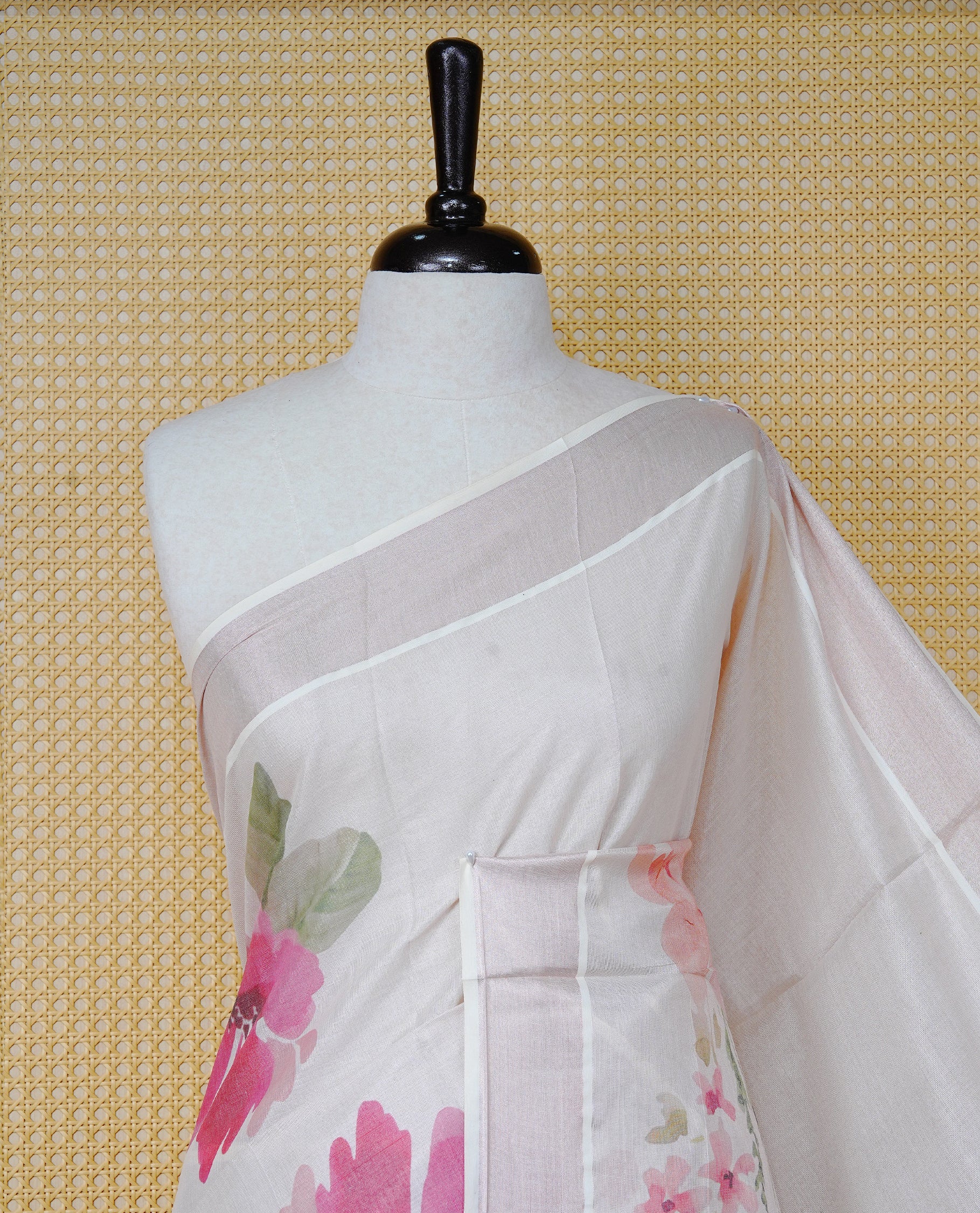 Cream Colour Tissue Kerala  Saree Featuring A Digital Floral Printed Body &  Pallu ,  Beautifully Enhanced With A Classic  Rose Gold Zari Border And Orange & Olive  Green  Tassels, Paired With A Matching Blouse Piece.