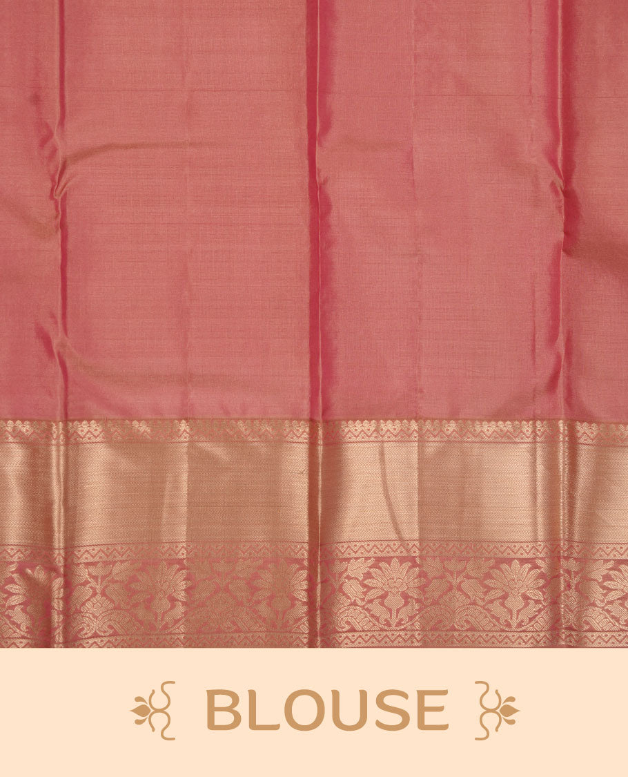 Powder pink Kancheepuram silk saree featuring floral jacquard on the body with a traditional border, paired with a matching blouse piece.