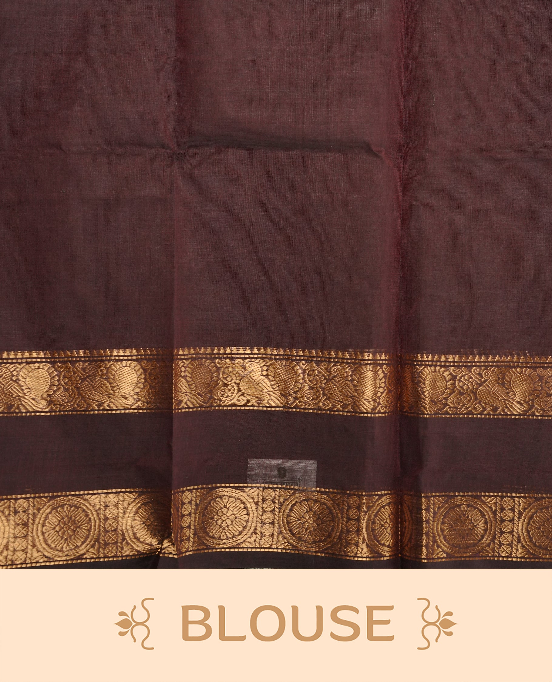 Dark chocolate colour Chettinad cotton saree featuring Elegant plain body, complemented by self colour with gold zari border, paired with matching blouse piece.