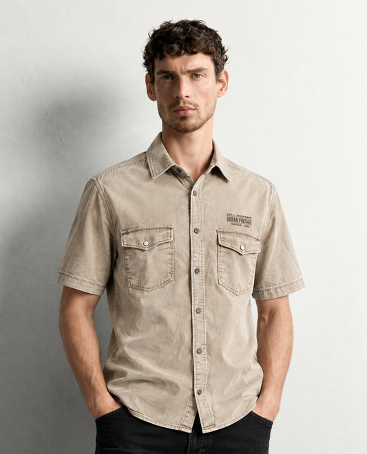Beige colour shirt denim style with Pockets on body, Half sleeve.