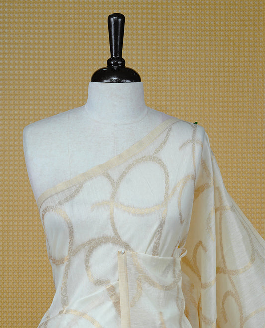 Cream colour Kerala saree featuring Light Gold Zari pattern, Red floral printed border & zari Border, pallu ,comes with matching blouse piece.