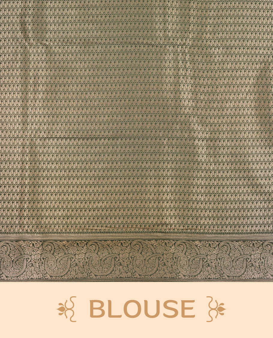 Purple colour semi silk brocade saree featuring intricate Gold Floral kodi & leaf patterns across the body, complemented by a contrast Green colour woven border and pallu, paired with a matching blouse.