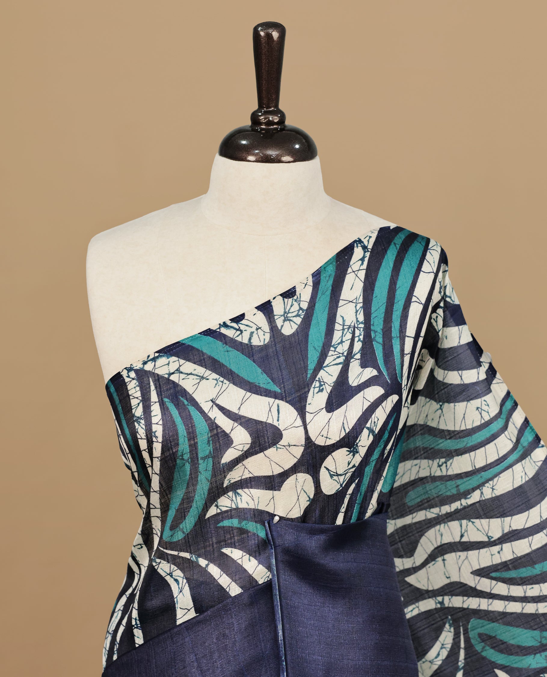 Peacock With Navy Blue Colour Khadi silk saree Featuring Abstract Print Patterned & Curved Wave Like Line Detailed Body, Paired with matching blouse piece.