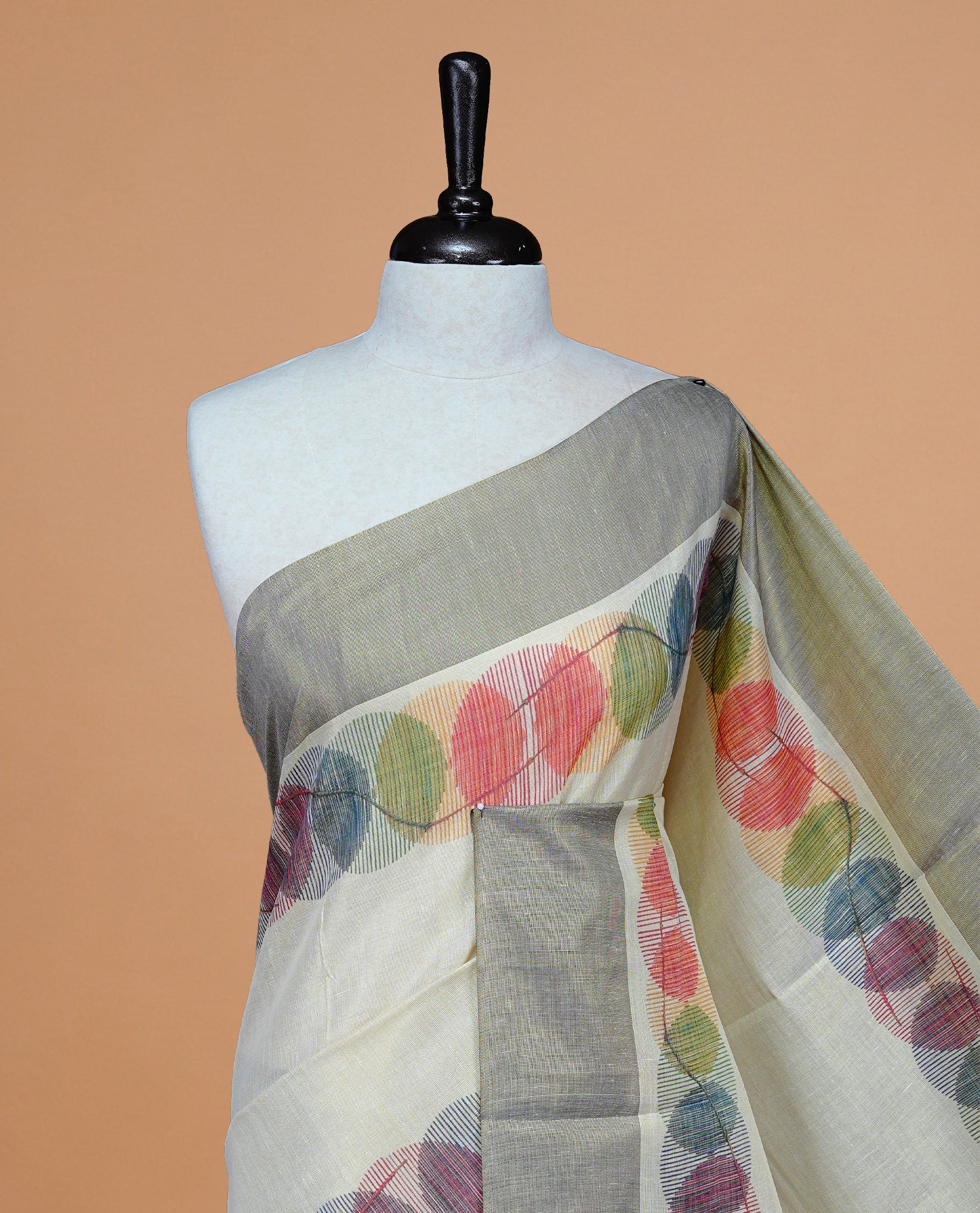 Cream Colour Tissue Kerala Saree Featuring Multicolour Circular Prints Along The Border And Pallu, Complemented By A Brown Border With Traditional Gold Zari Accents, Paired With A Matching Blouse Piece.