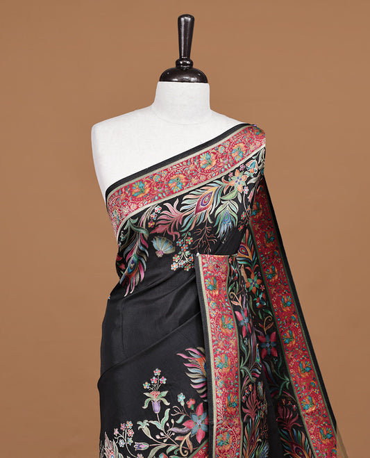 Black colour pashmina saree featuring Multi colour floral kodi & peacock leaf patterned border and pallu, paired with matching blouse piece.