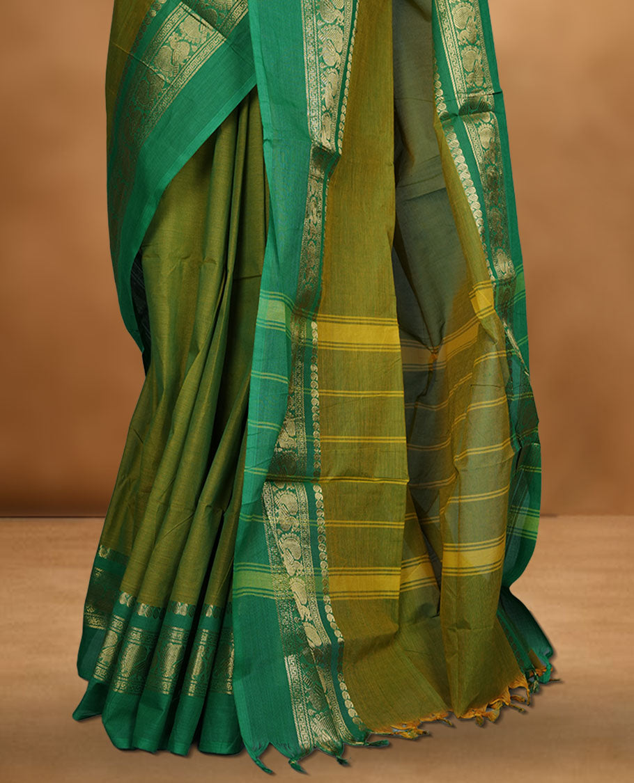 Lemon colour chettinad cotton saree featuring plain body, contrast Green colour with traditional gold zari border paired with matching blouse.
