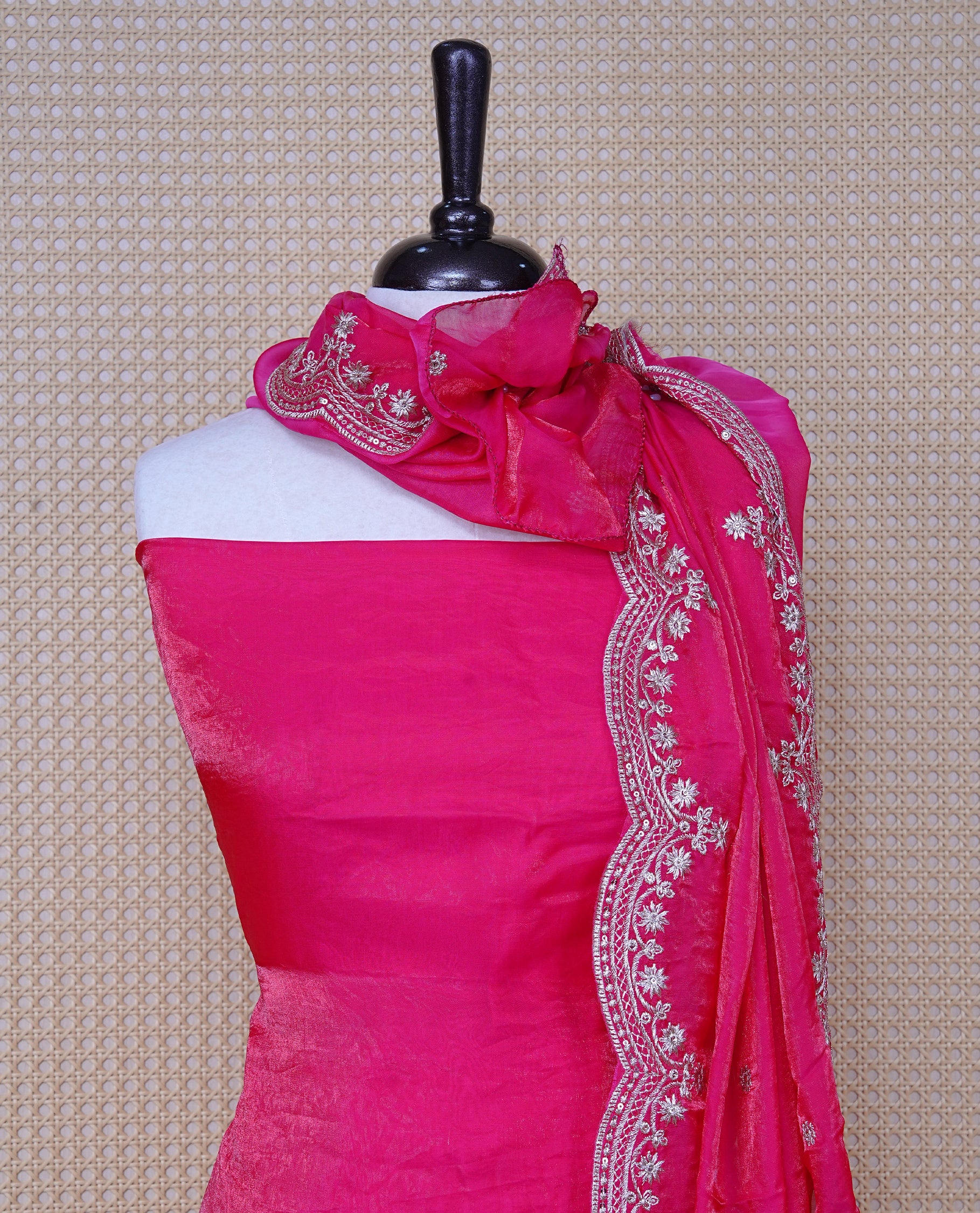 Rani Pink colour Fendy silk salwar material With Elegant plain body with lining, Comes with santoon bottom, Fendy silk dupatta With Floral buttas & Scalp Border.