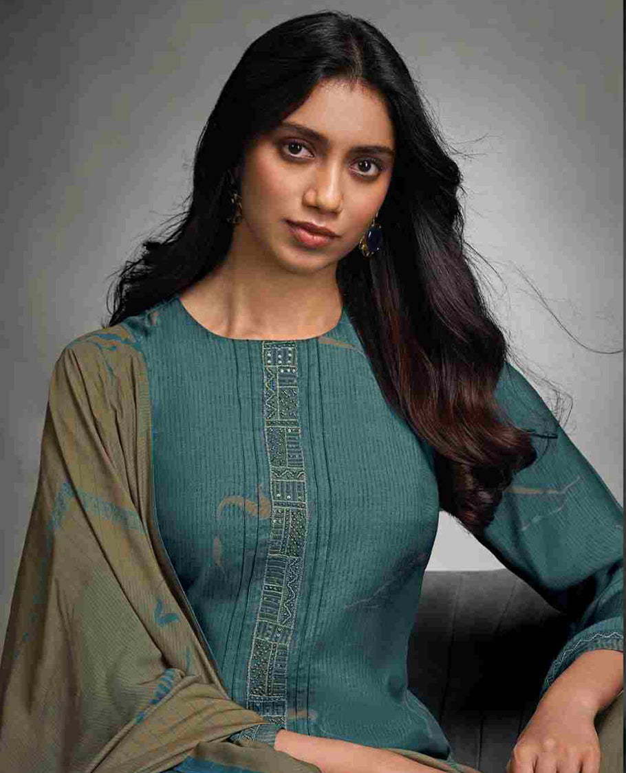 Teal Blue colour suit material with pakiza silk digital print top with embroidery worked sleeve, paired with matching satin bottom and contrast colour pakiza light weight print with embroidery lace dupatta.