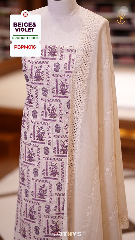 Beige & violet Hakoba cotton churidhar material with violet & green floral top, lace border under the top and sides & Cotton dupatta with lace detailing & plain bottom for elegant wear.