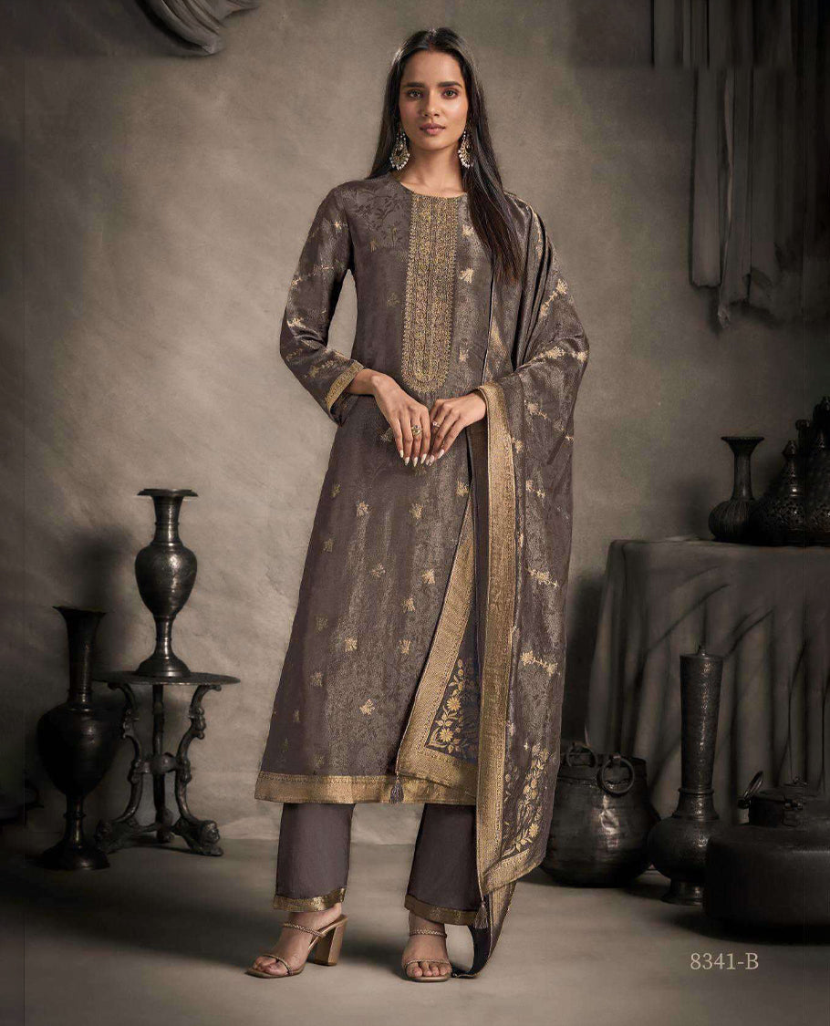 Gray colour suit material featuring an Akina silk jacquard top with delicate embroidery, paired with satin bottoms and completed with a matching Akina silk jacquard dupatta