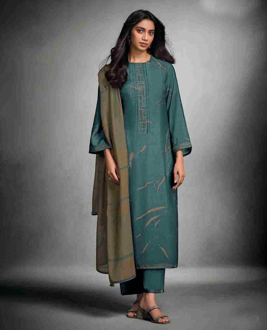 Teal Blue colour suit material with pakiza silk digital print top with embroidery worked sleeve, paired with matching satin bottom and contrast colour pakiza light weight print with embroidery lace dupatta.