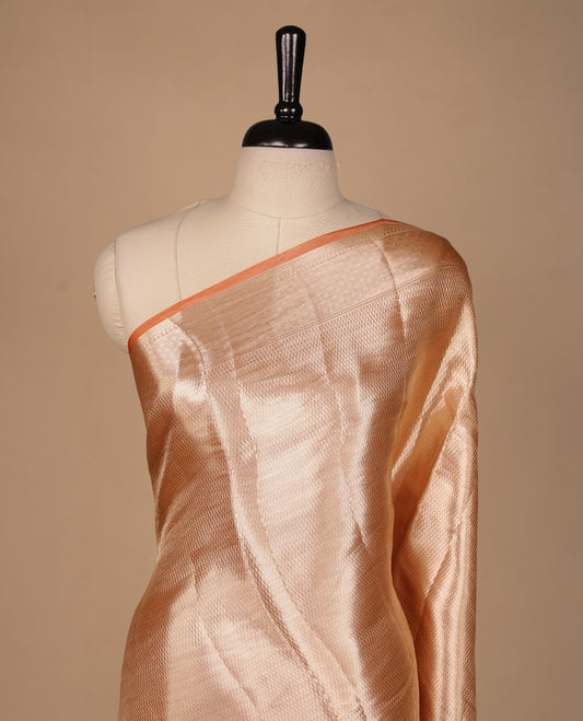 Orange & gold double shade pure banaras tissue silk saree featuring gold zari pattern on body, complemented by orange piping with traditional border, paired with matching blouse piece.