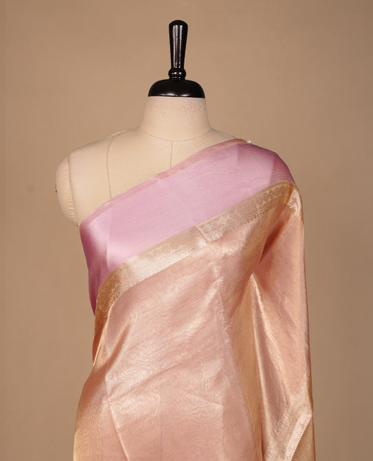 Pink & gold double shade pure banaras tissue silk saree featuring elegant plain body, complemented by contrast pastel pink colour gold zari border, paired with matching blouse piece.
