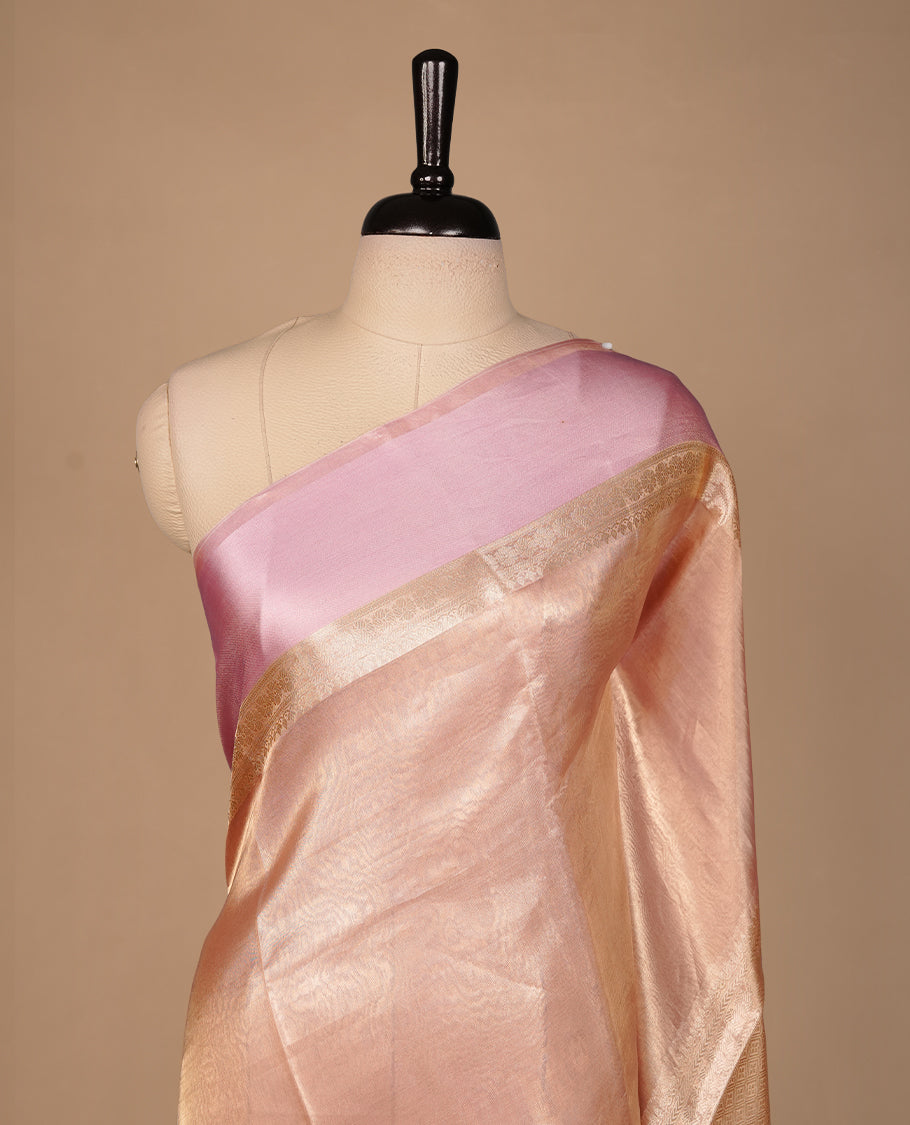 Pink & gold double shade pure banaras tissue silk saree featuring elegant plain body, complemented by contrast pastel pink colour gold zari border, paired with matching blouse piece.